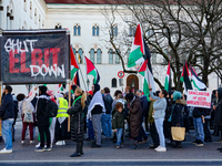 A demonstration in Munich, Germany, on November 16, 2024, includes pro-Palestinian demonstrators and pro-Israeli counter-demonstrators with...