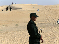 The photo, taken in Oued Souf, Algeria, on November 16, 2024, shows the Algerian National Gendarmerie during the 6th International Saharan T...