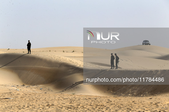 The photo, taken in Oued Souf, Algeria, on November 16, 2024, shows the Algerian National Gendarmerie during the 6th International Saharan T...