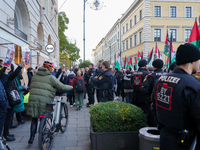 A demonstration in Munich, Germany, on November 16, 2024, includes pro-Palestinian demonstrators and pro-Israeli counter-demonstrators with...