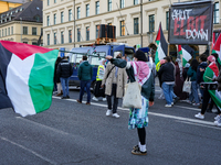 A demonstration in Munich, Germany, on November 16, 2024, includes pro-Palestinian demonstrators and pro-Israeli counter-demonstrators with...