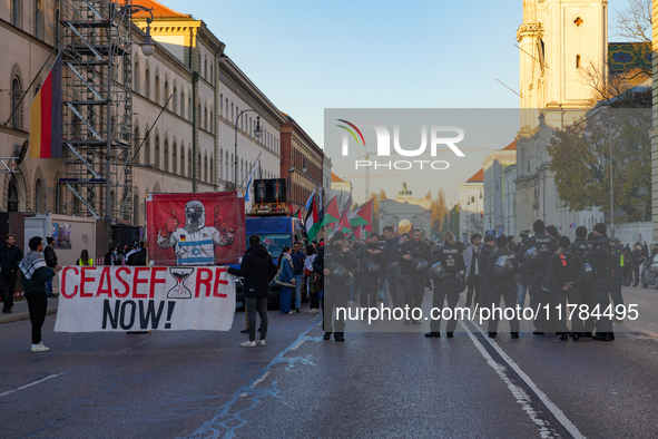 A demonstration in Munich, Germany, on November 16, 2024, includes pro-Palestinian demonstrators and pro-Israeli counter-demonstrators with...