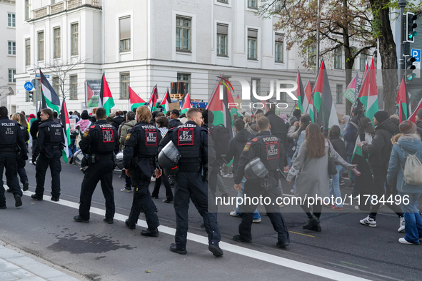 A demonstration in Munich, Germany, on November 16, 2024, includes pro-Palestinian demonstrators and pro-Israeli counter-demonstrators with...