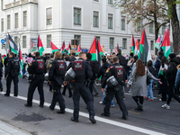 A demonstration in Munich, Germany, on November 16, 2024, includes pro-Palestinian demonstrators and pro-Israeli counter-demonstrators with...