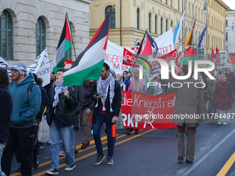 A demonstration in Munich, Germany, on November 16, 2024, includes pro-Palestinian demonstrators and pro-Israeli counter-demonstrators with...