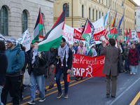 A demonstration in Munich, Germany, on November 16, 2024, includes pro-Palestinian demonstrators and pro-Israeli counter-demonstrators with...