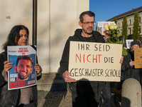 A demonstration in Munich, Germany, on November 16, 2024, includes pro-Palestinian demonstrators and pro-Israeli counter-demonstrators with...