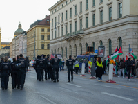 A demonstration in Munich, Germany, on November 16, 2024, includes pro-Palestinian demonstrators and pro-Israeli counter-demonstrators with...