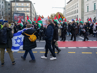 A demonstration in Munich, Germany, on November 16, 2024, includes pro-Palestinian demonstrators and pro-Israeli counter-demonstrators with...