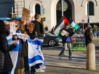 A demonstration in Munich, Germany, on November 16, 2024, includes pro-Palestinian demonstrators and pro-Israeli counter-demonstrators with...