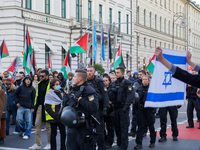 A demonstration in Munich, Germany, on November 16, 2024, includes pro-Palestinian demonstrators and pro-Israeli counter-demonstrators with...