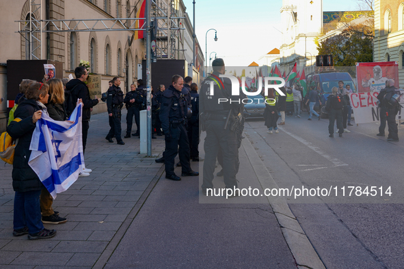 A demonstration in Munich, Germany, on November 16, 2024, includes pro-Palestinian demonstrators and pro-Israeli counter-demonstrators with...