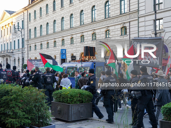 A demonstration in Munich, Germany, on November 16, 2024, includes pro-Palestinian demonstrators and pro-Israeli counter-demonstrators with...