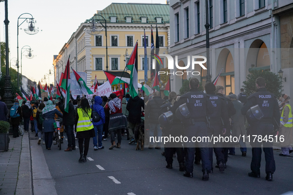 A demonstration in Munich, Germany, on November 16, 2024, includes pro-Palestinian demonstrators and pro-Israeli counter-demonstrators with...