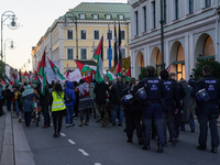 A demonstration in Munich, Germany, on November 16, 2024, includes pro-Palestinian demonstrators and pro-Israeli counter-demonstrators with...