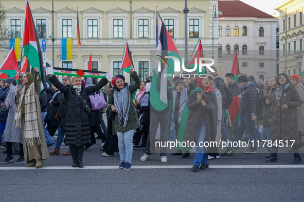 A demonstration in Munich, Germany, on November 16, 2024, includes pro-Palestinian demonstrators and pro-Israeli counter-demonstrators with...