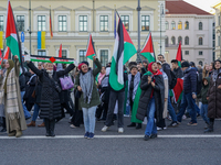 A demonstration in Munich, Germany, on November 16, 2024, includes pro-Palestinian demonstrators and pro-Israeli counter-demonstrators with...