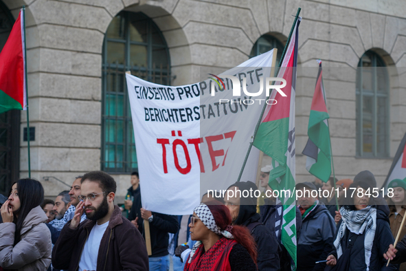 A demonstration in Munich, Germany, on November 16, 2024, includes pro-Palestinian demonstrators and pro-Israeli counter-demonstrators with...