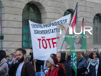 A demonstration in Munich, Germany, on November 16, 2024, includes pro-Palestinian demonstrators and pro-Israeli counter-demonstrators with...