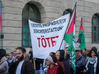 A demonstration in Munich, Germany, on November 16, 2024, includes pro-Palestinian demonstrators and pro-Israeli counter-demonstrators with...