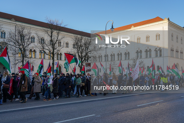 A demonstration in Munich, Germany, on November 16, 2024, includes pro-Palestinian demonstrators and pro-Israeli counter-demonstrators with...