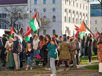 A demonstration in Munich, Germany, on November 16, 2024, includes pro-Palestinian demonstrators and pro-Israeli counter-demonstrators with...