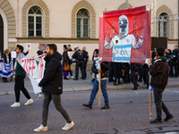 A demonstration in Munich, Germany, on November 16, 2024, includes pro-Palestinian demonstrators and pro-Israeli counter-demonstrators with...