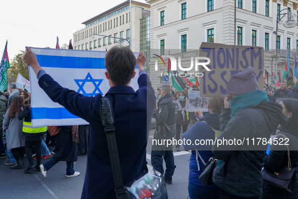 A demonstration in Munich, Germany, on November 16, 2024, includes pro-Palestinian demonstrators and pro-Israeli counter-demonstrators with...