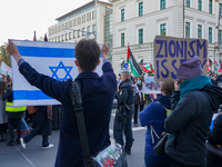 A demonstration in Munich, Germany, on November 16, 2024, includes pro-Palestinian demonstrators and pro-Israeli counter-demonstrators with...