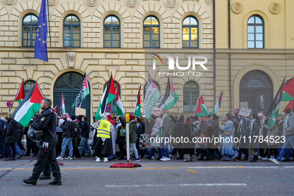 A demonstration in Munich, Germany, on November 16, 2024, includes pro-Palestinian demonstrators and pro-Israeli counter-demonstrators with...