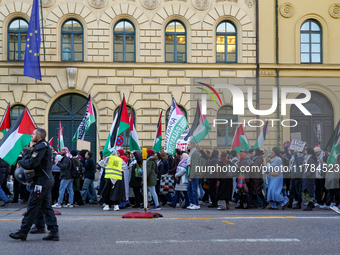 A demonstration in Munich, Germany, on November 16, 2024, includes pro-Palestinian demonstrators and pro-Israeli counter-demonstrators with...