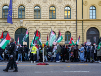 A demonstration in Munich, Germany, on November 16, 2024, includes pro-Palestinian demonstrators and pro-Israeli counter-demonstrators with...