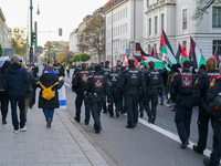 A demonstration in Munich, Germany, on November 16, 2024, includes pro-Palestinian demonstrators and pro-Israeli counter-demonstrators with...