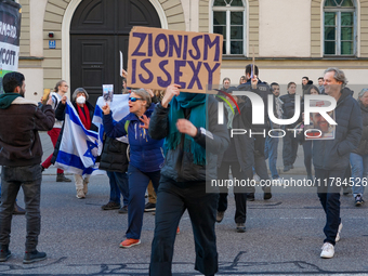 A demonstration in Munich, Germany, on November 16, 2024, includes pro-Palestinian demonstrators and pro-Israeli counter-demonstrators with...