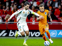 Hungary midfielder Dominik Szoboszlai and Netherlands forward Noa Lang participate in the match between the Netherlands and Hungary at the J...