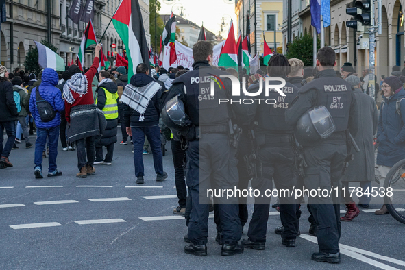 A demonstration in Munich, Germany, on November 16, 2024, includes pro-Palestinian demonstrators and pro-Israeli counter-demonstrators with...