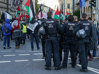 A demonstration in Munich, Germany, on November 16, 2024, includes pro-Palestinian demonstrators and pro-Israeli counter-demonstrators with...