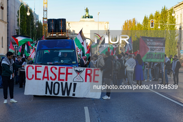 A demonstration in Munich, Germany, on November 16, 2024, includes pro-Palestinian demonstrators and pro-Israeli counter-demonstrators with...