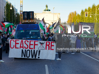 A demonstration in Munich, Germany, on November 16, 2024, includes pro-Palestinian demonstrators and pro-Israeli counter-demonstrators with...