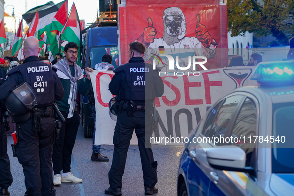 A demonstration in Munich, Germany, on November 16, 2024, includes pro-Palestinian demonstrators and pro-Israeli counter-demonstrators with...