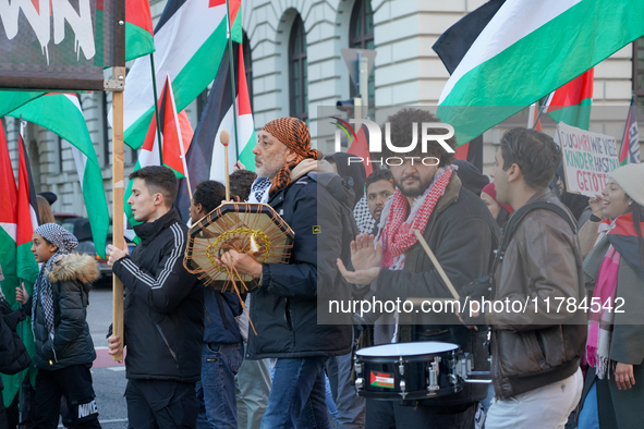 A demonstration in Munich, Germany, on November 16, 2024, includes pro-Palestinian demonstrators and pro-Israeli counter-demonstrators with...