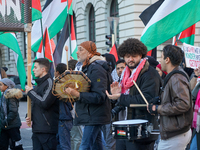 A demonstration in Munich, Germany, on November 16, 2024, includes pro-Palestinian demonstrators and pro-Israeli counter-demonstrators with...