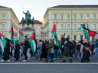 A demonstration in Munich, Germany, on November 16, 2024, includes pro-Palestinian demonstrators and pro-Israeli counter-demonstrators with...