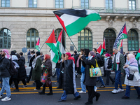 A demonstration in Munich, Germany, on November 16, 2024, includes pro-Palestinian demonstrators and pro-Israeli counter-demonstrators with...