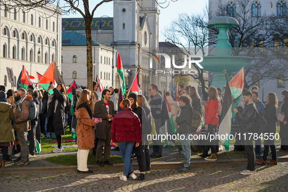 A demonstration in Munich, Germany, on November 16, 2024, includes pro-Palestinian demonstrators and pro-Israeli counter-demonstrators with...