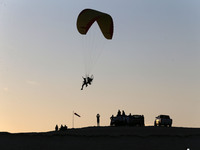 The photo, taken in Oued Souf, Algeria, on November 16, 2024, shows a sunset during the 6th International Saharan Tourism Festival (FITS). O...