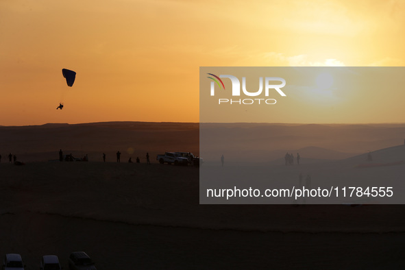 The photo, taken in Oued Souf, Algeria, on November 16, 2024, shows a sunset during the 6th International Saharan Tourism Festival (FITS). O...