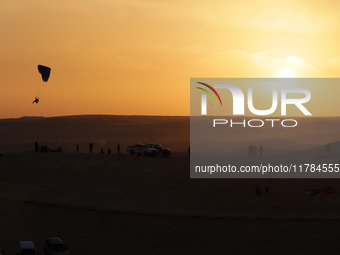 The photo, taken in Oued Souf, Algeria, on November 16, 2024, shows a sunset during the 6th International Saharan Tourism Festival (FITS). O...