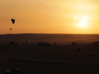 The photo, taken in Oued Souf, Algeria, on November 16, 2024, shows a sunset during the 6th International Saharan Tourism Festival (FITS). O...