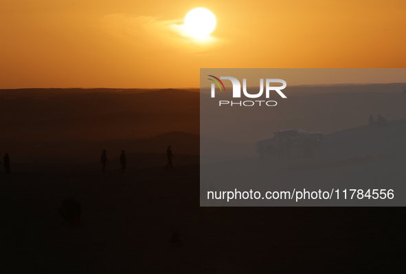 The photo, taken in Oued Souf, Algeria, on November 16, 2024, shows a sunset during the 6th International Saharan Tourism Festival (FITS). O...